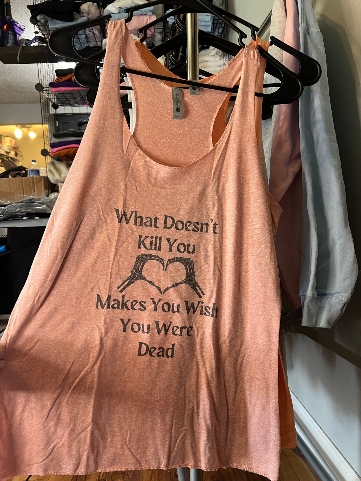 What doesn’t kill your tank top size large